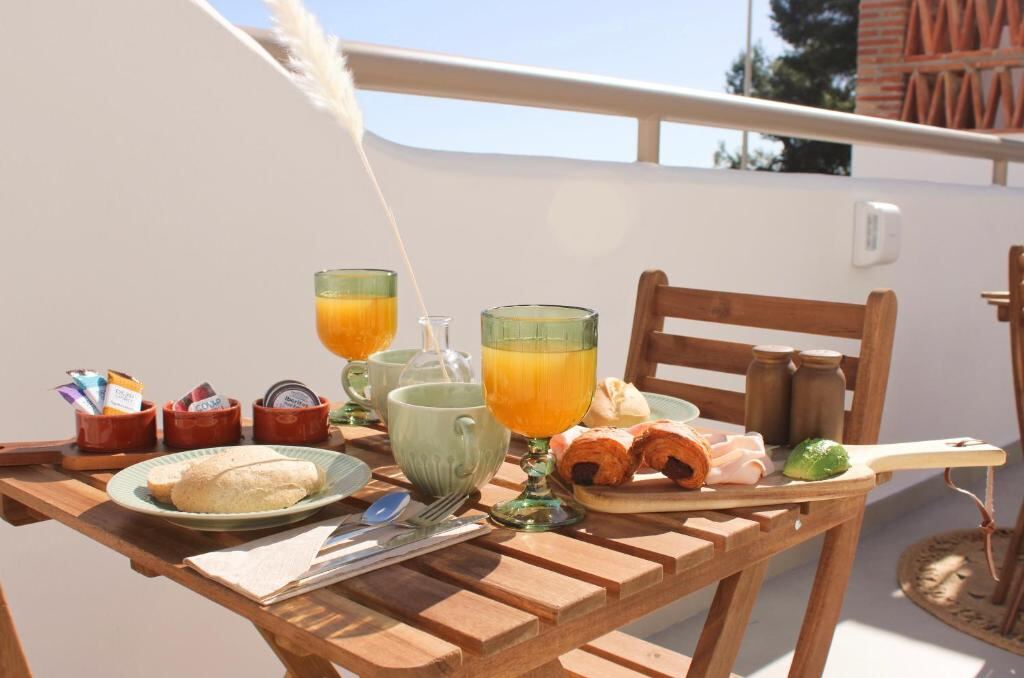 Breakfast served on the sunny terrace